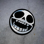 Gorillaz mascot, Bonesy, depicted as a skull symbol: Round Frameless Manga Silhouette, Gamer Room Decor - LiquidMirror